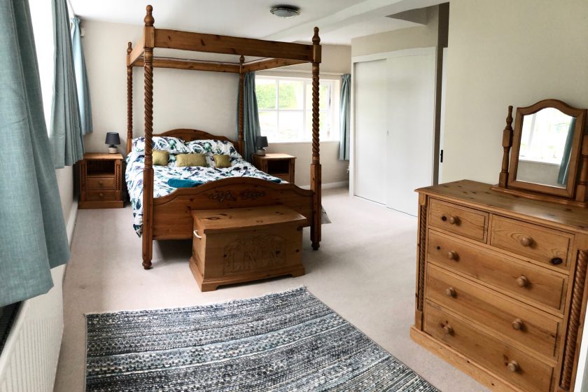 Master bedroom at Fell Foot with king-size four-poster bed