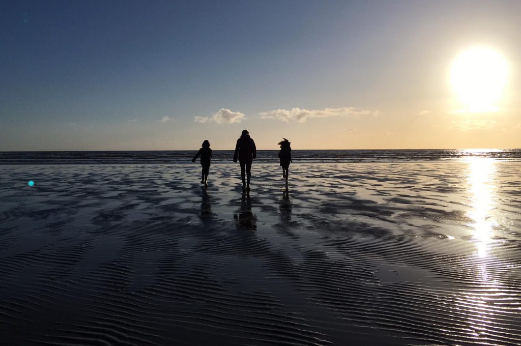 family at drigg beach